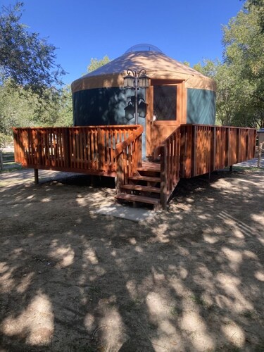 Glamp in style in our 16' yurt, situated on Cedar Creek.