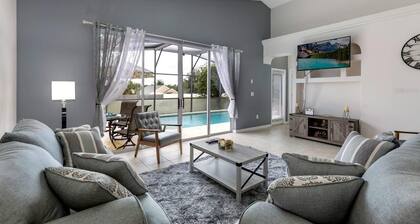 Lovely home near Disney with a Heated pool and game room in a resort community.