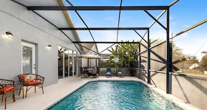 Lovely home near Disney with a Heated pool and game room in a resort community.