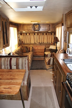 Living area. Cozy 80s Safari Style RV in Tranquil Bombay Beach with AC