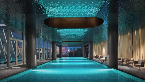 A modern indoor swimming pool with a clear view of the cityscape through large windows. - Hotel Indigo Ningbo Riverside by IHG (Ningbo)