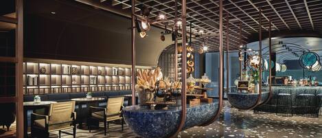 A modern interior with a bar area, seating, and a unique ceiling design.