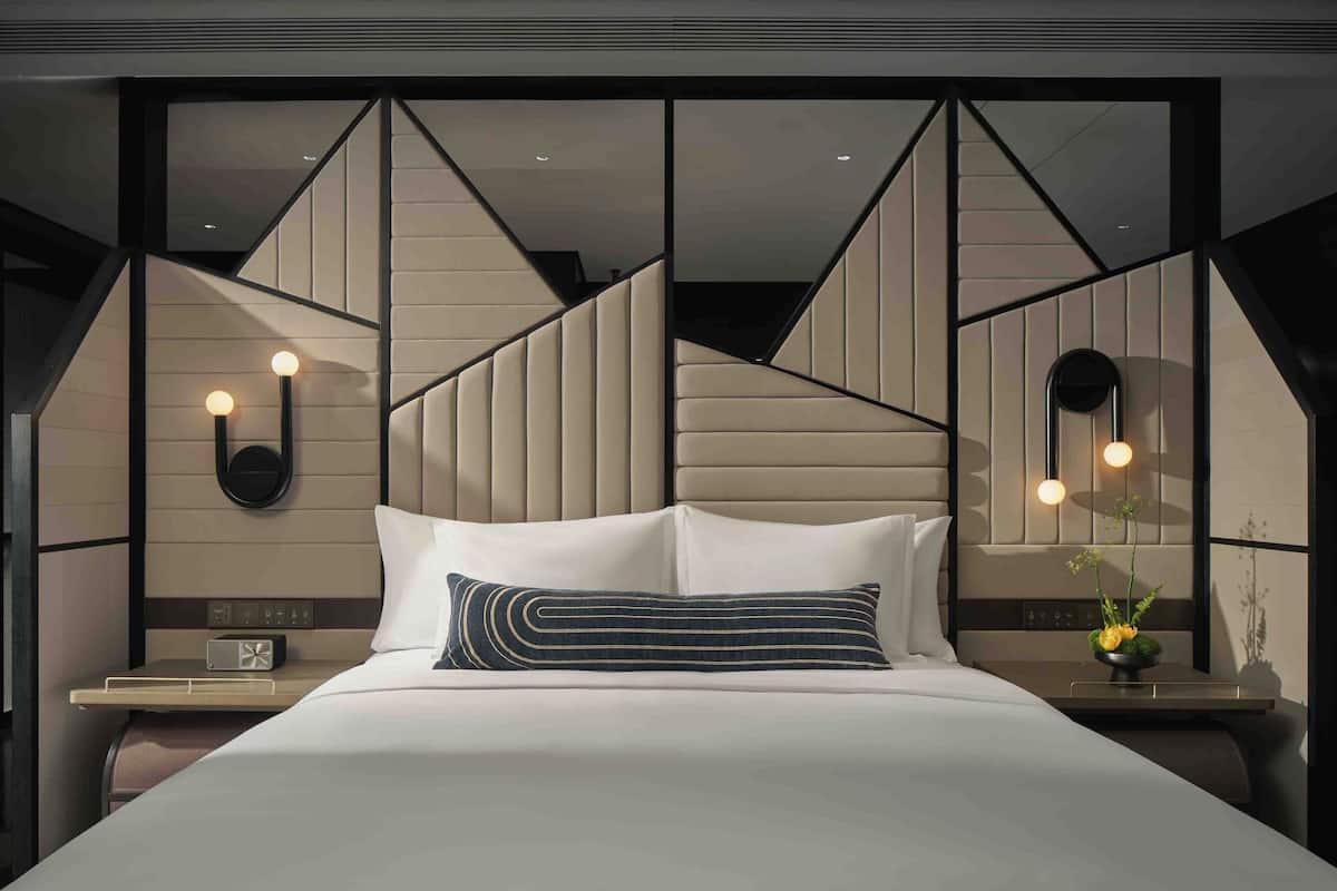 1 habitación, cubrecamas y minibar con artículos gratuitos