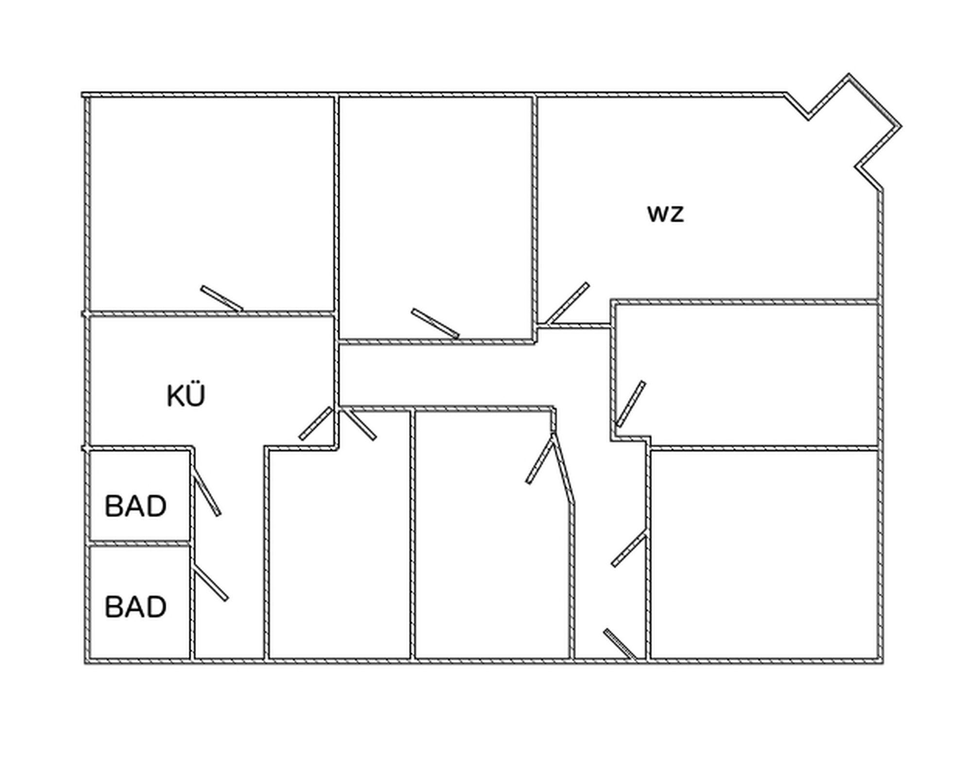 A floor plan with labeled rooms: 'KÜ', 'BAD', and 'WZ'.