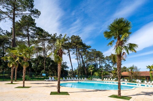 Maison de vacances « Cosy Pavillon 2 chambres proche mer » avec piscine partagée, terrasse privée et Wi-Fi
