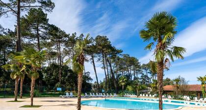 Maison de vacances « Cosy Pavillon 2 chambres proche mer » avec piscine partagée, terrasse privée et Wi-Fi