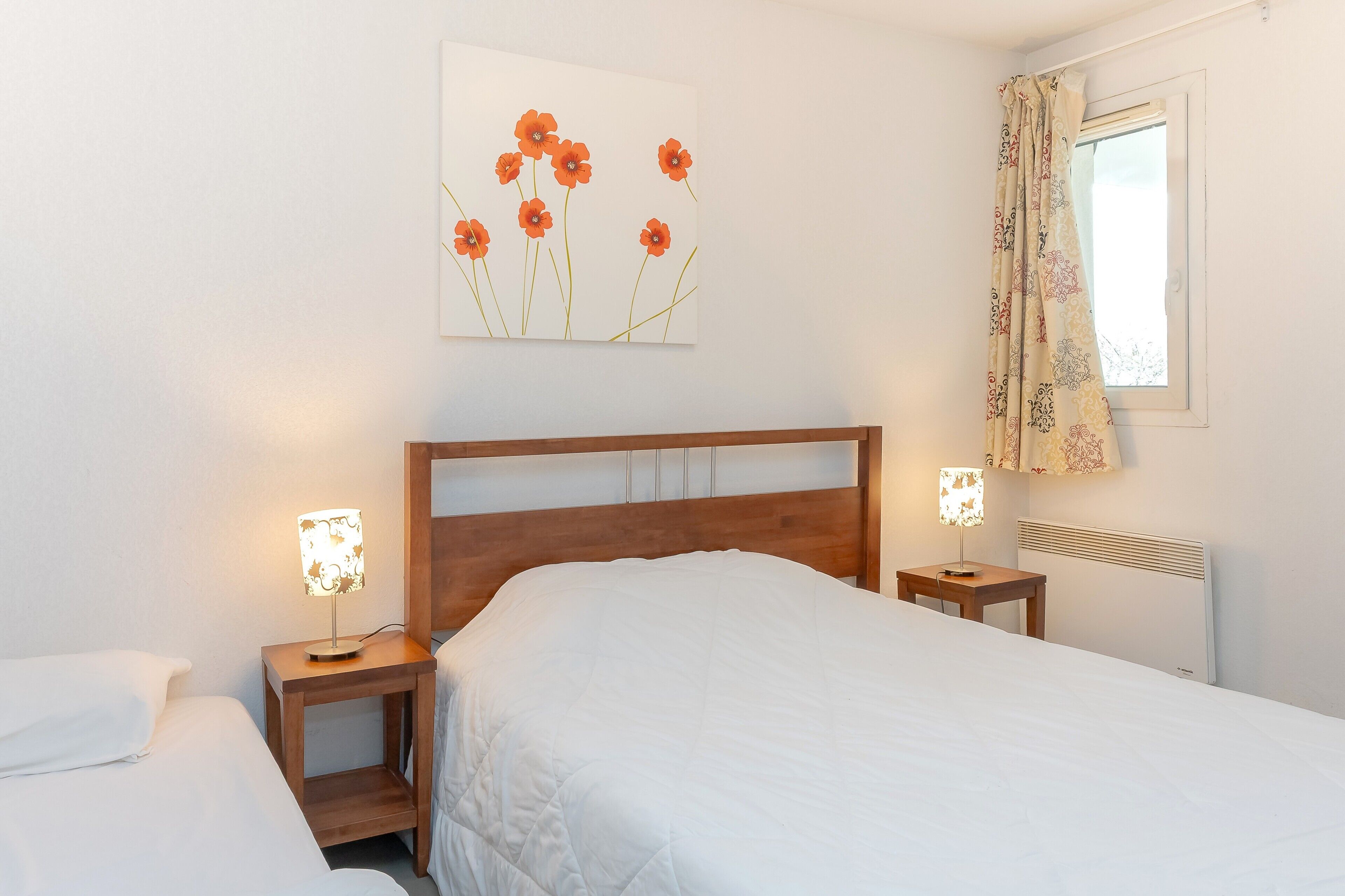 2 slaapkamers, een strijkplank/strijkijzer