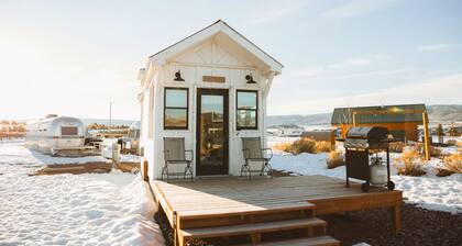Tiny Home with one Queen bed on main floor and one Queen bed in loft. Sleeps: 4
