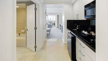 Fridge, microwave, stovetop, coffee/tea maker