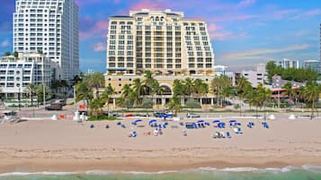 On the beach, sun loungers, beach towels