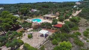 An aerial view of a property with a swimming pool, a covered patio, and a red-roofed building. - 1159 Perla Bianca by Perle di Puglia (Ugento)
