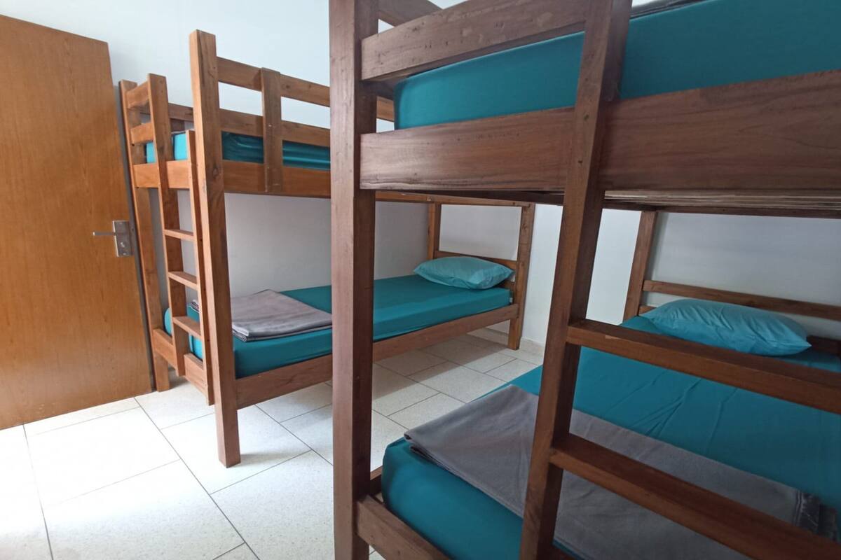 Bed in 4-bed Mixed Dormitory | Arbejdsområde til bærbare computere, gratis Wi-Fi, sengetøj
