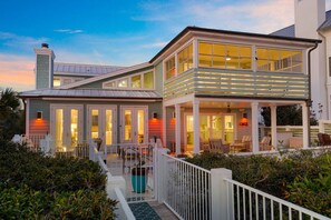 Relax on the spacious balcony with comfortable seating and take in the serene garden views.
