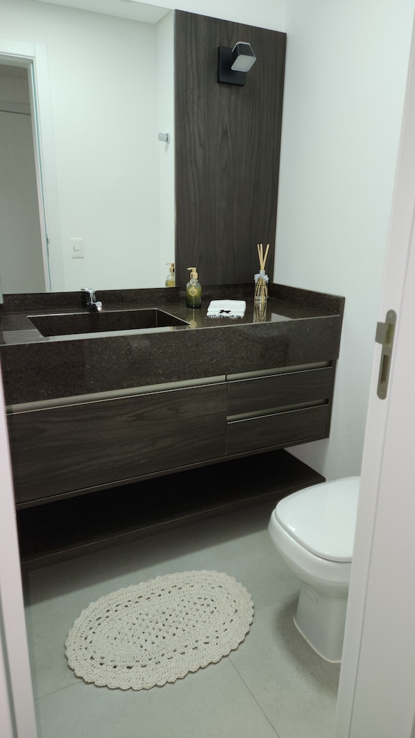 Hair dryer, towels, soap, shampoo