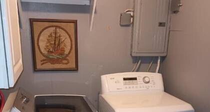 Cozy 2-bedroom home 1 bath in DeWitt full kitchen Enclosed back yard, fire pit