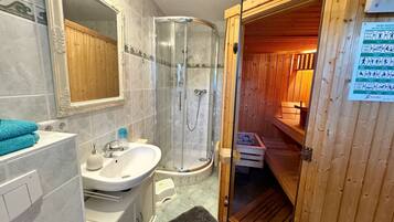 Shower, hair dryer, towels