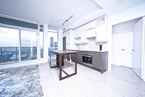 Design Apartment | Private kitchen - RivetStays - The Well (Toronto)