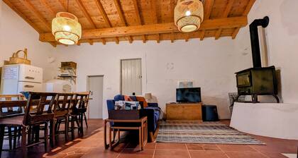 Relax and unwind in this stylish Portuguese Farmhouse.