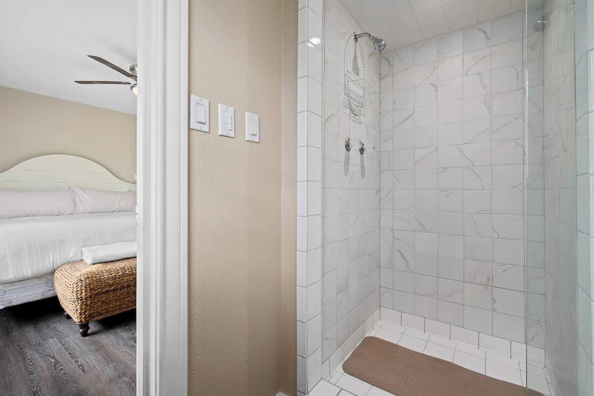 Shower, hair dryer, towels, shampoo