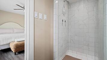 Shower, hair dryer, towels, shampoo