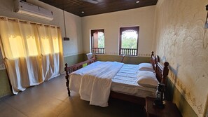 Deluxe Double Room, 1 Queen Bed, Garden View | Rollaway beds, free WiFi, bed sheets