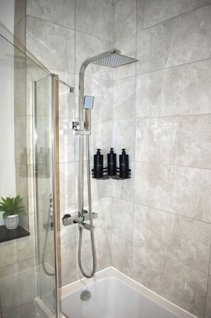 Hair dryer, towels, soap, shampoo