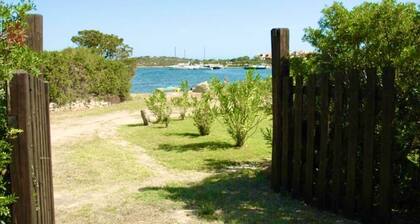 Detached beachfront house with private beach access.
