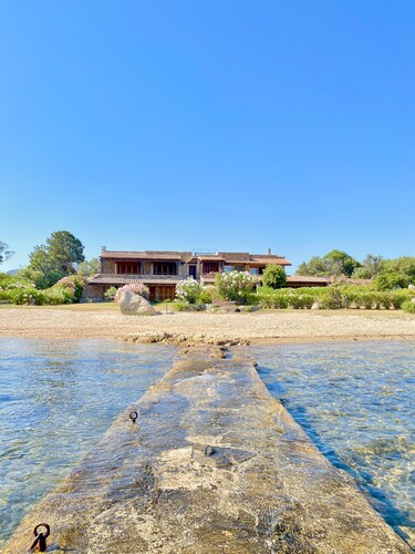 Detached beachfront house with private beach access.