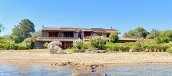 Detached beachfront house with private beach access.