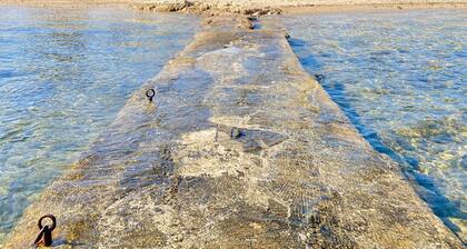 Detached beachfront house with private beach access.