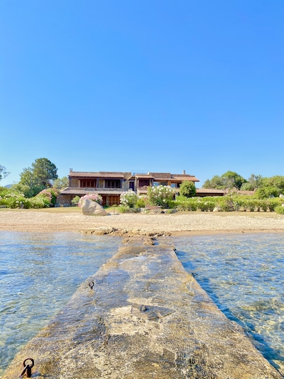 Detached beachfront house with private beach access.