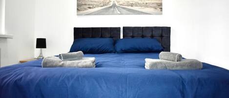 2 quartos, ferros/tábuas de passar roupa, Wi-Fi, roupa de cama