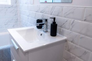 Hair dryer, towels, soap, toilet paper