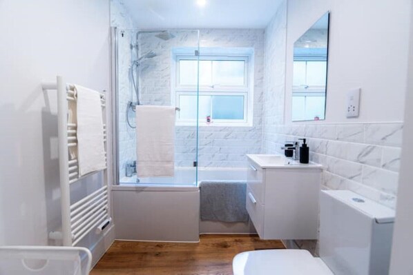 Hair dryer, towels, soap, toilet paper