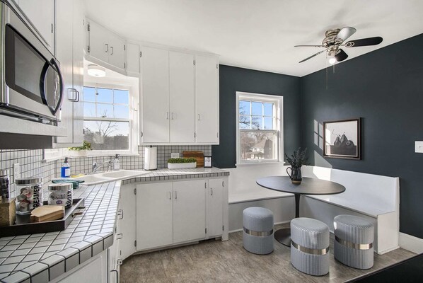 Fridge, microwave, oven, stovetop - Charming Benson Home, 3BR with Fenced Yard! (Omaha)