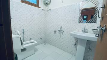 Shower, rainfall showerhead, towels, soap