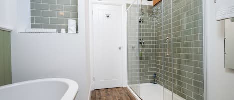 Shower, eco-friendly toiletries, towels, soap