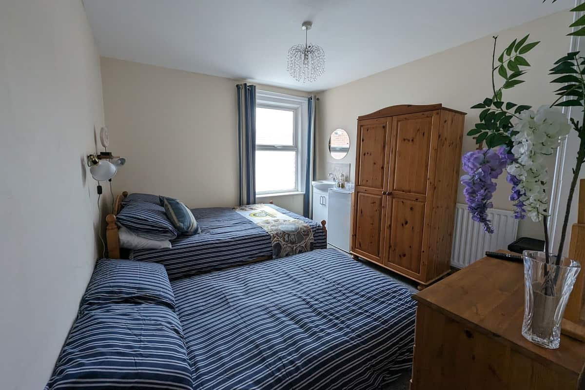 1 bedroom, premium bedding, blackout curtains, iron/ironing board