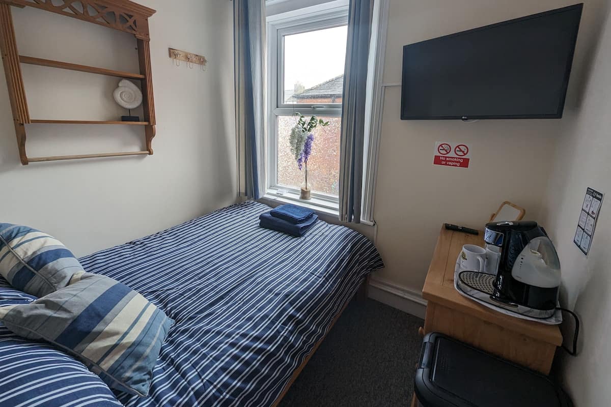 1 bedroom, premium bedding, blackout curtains, iron/ironing board