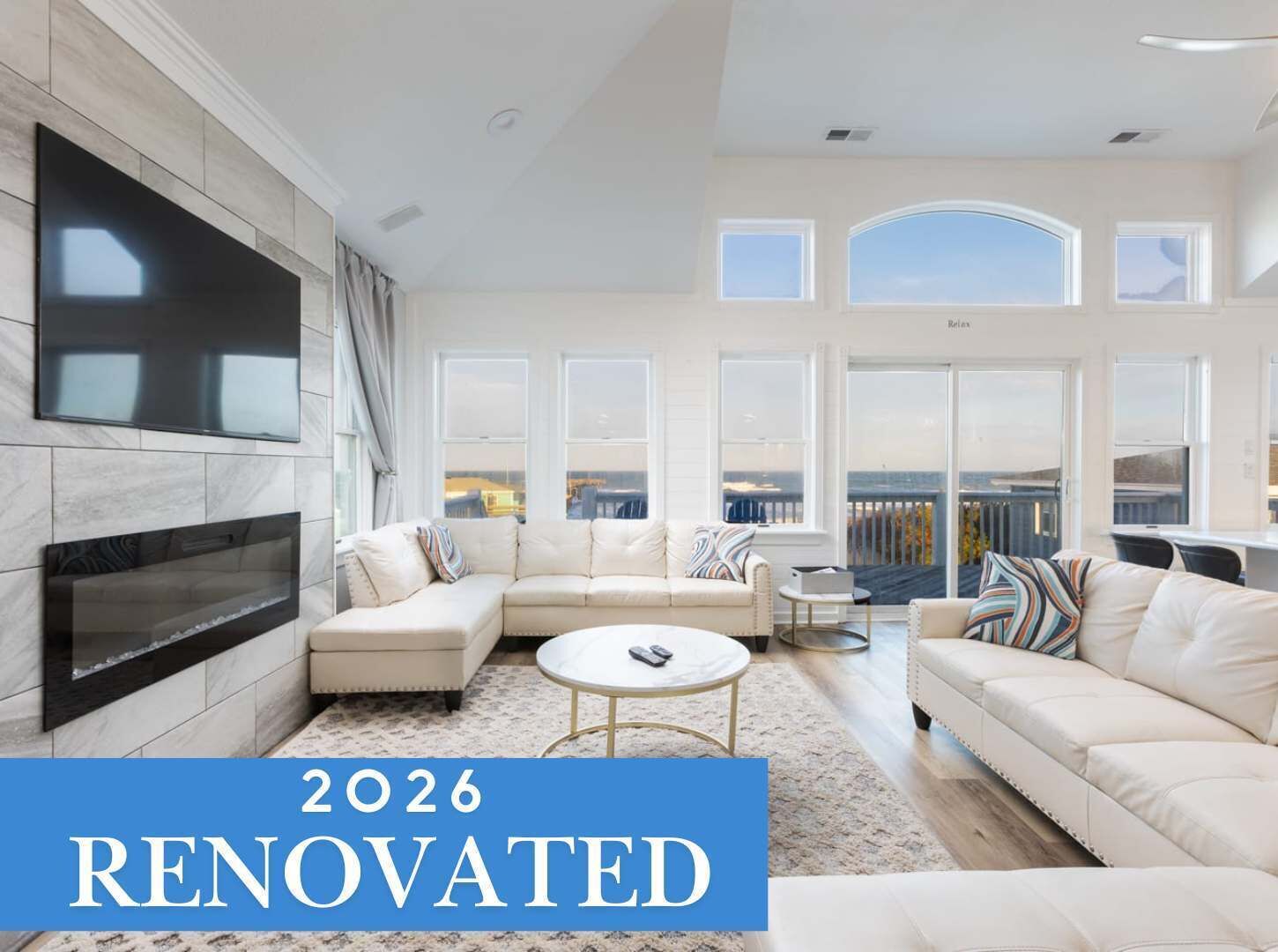 Televisión, chimenea y oficina 