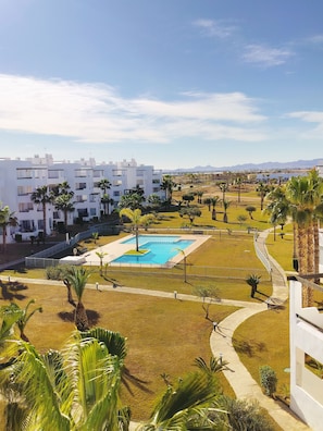 Outdoor pool - Sunny, Cosy Apartment with Balcony and Swimming Pool & Golf Course Views (Roldan)