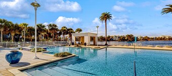 Lakefront resort condo with heated outdoor pool, hot tub, balcony, lake views