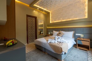 Coffres-forts dans les chambres, fer et planche à repasser