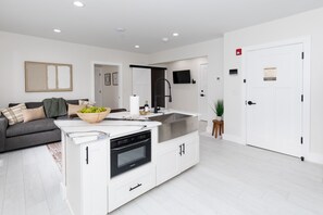 Condo, 1 Bedroom | Private kitchen | Full-size fridge, microwave, oven, stovetop - The Inn at Fulton (Sandusky)