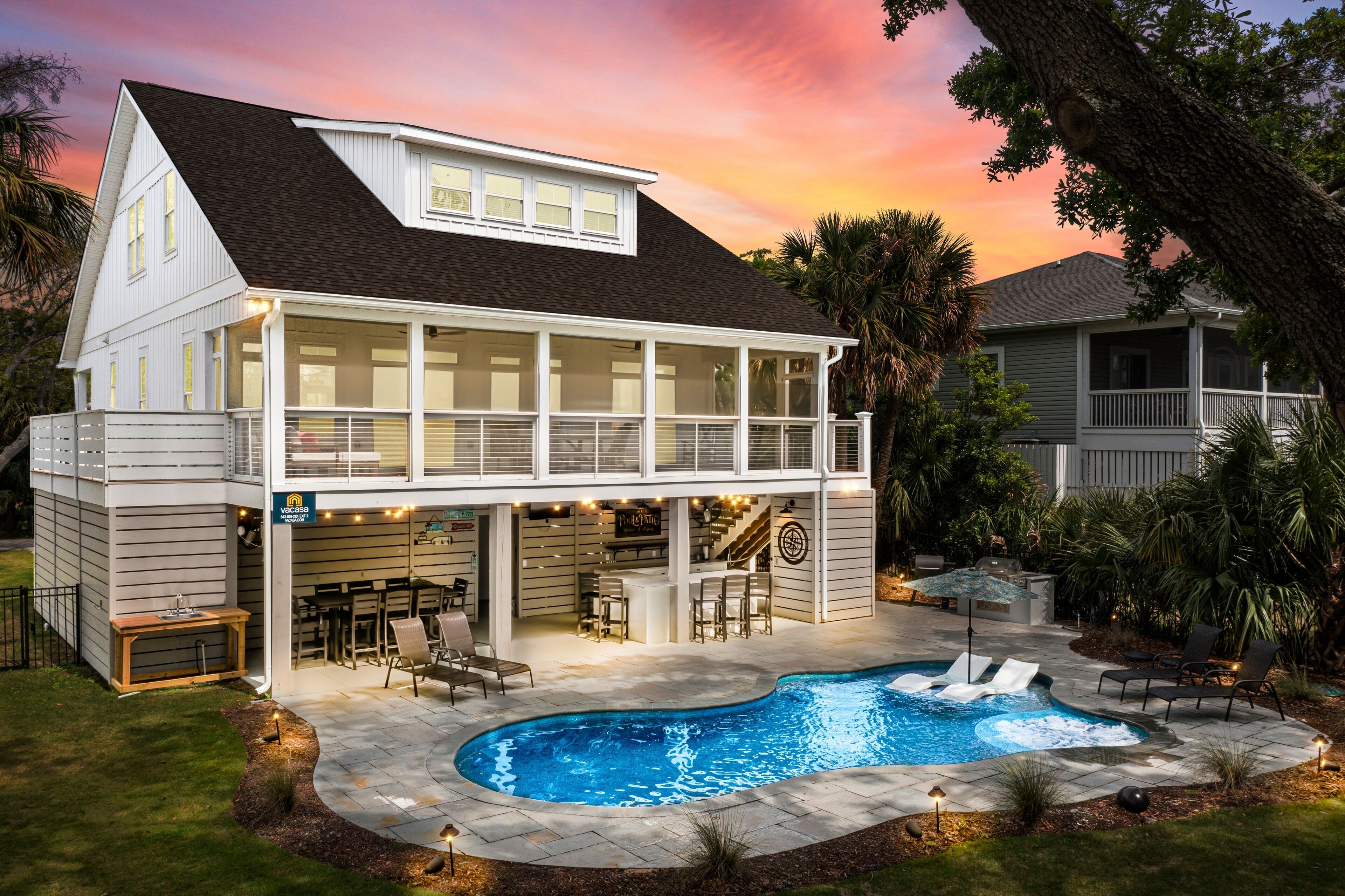3rd-row home near beach with private heated pool, pool spa, grill, patio, & W/D