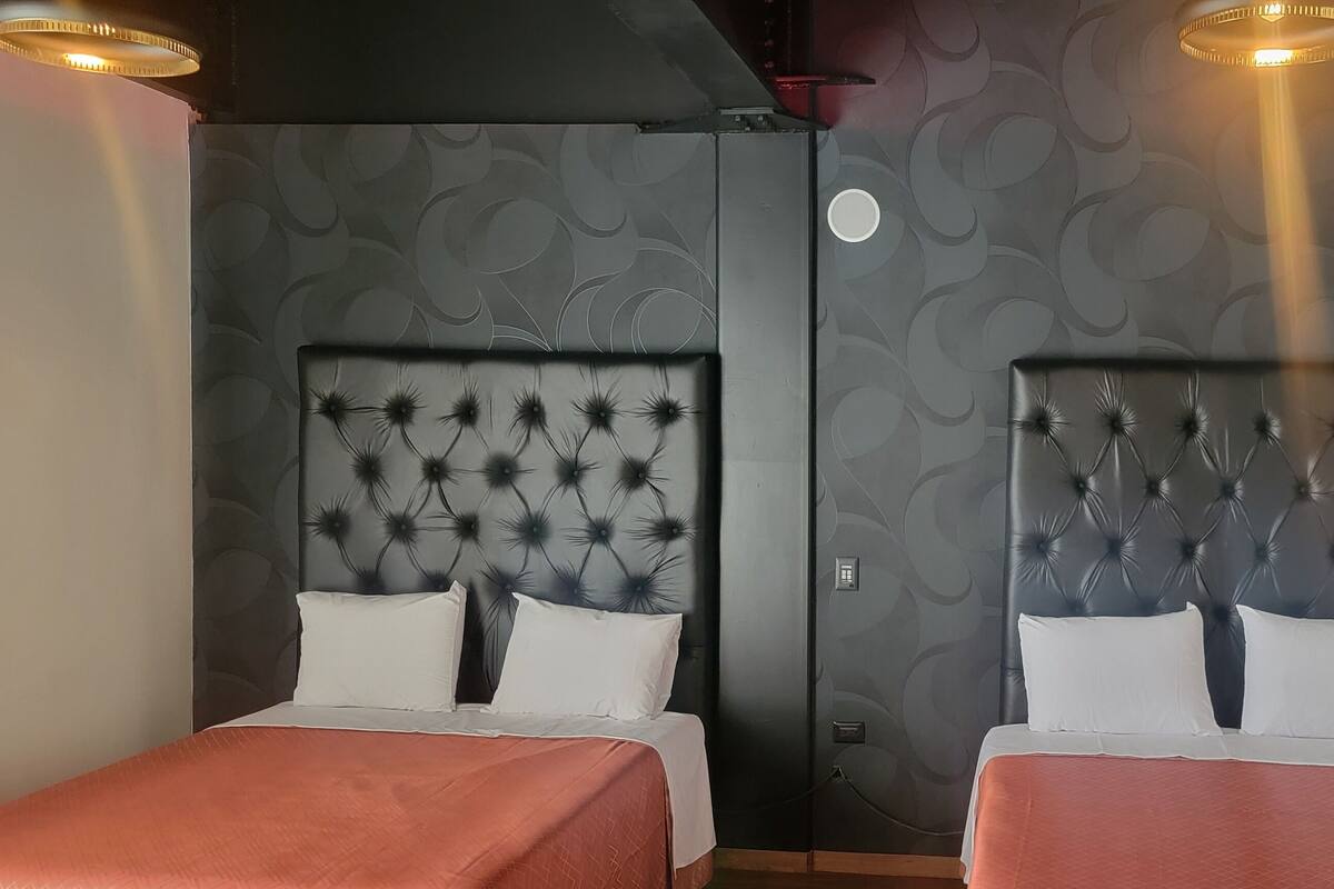Business Quadruple Room, City View | Down comforters, Select Comfort beds, soundproofing, WiFi (free)