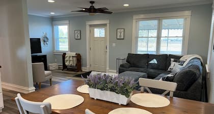 Cozy cottage that allows for pets, the experience of outdoors, and the big city!