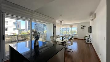 Panoramic Apartment, Mixed Dorm | Living area | Flat-screen TV