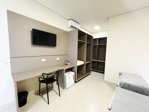 Habitación triple estándar | Minibar, wifi gratis y ropa de cama 