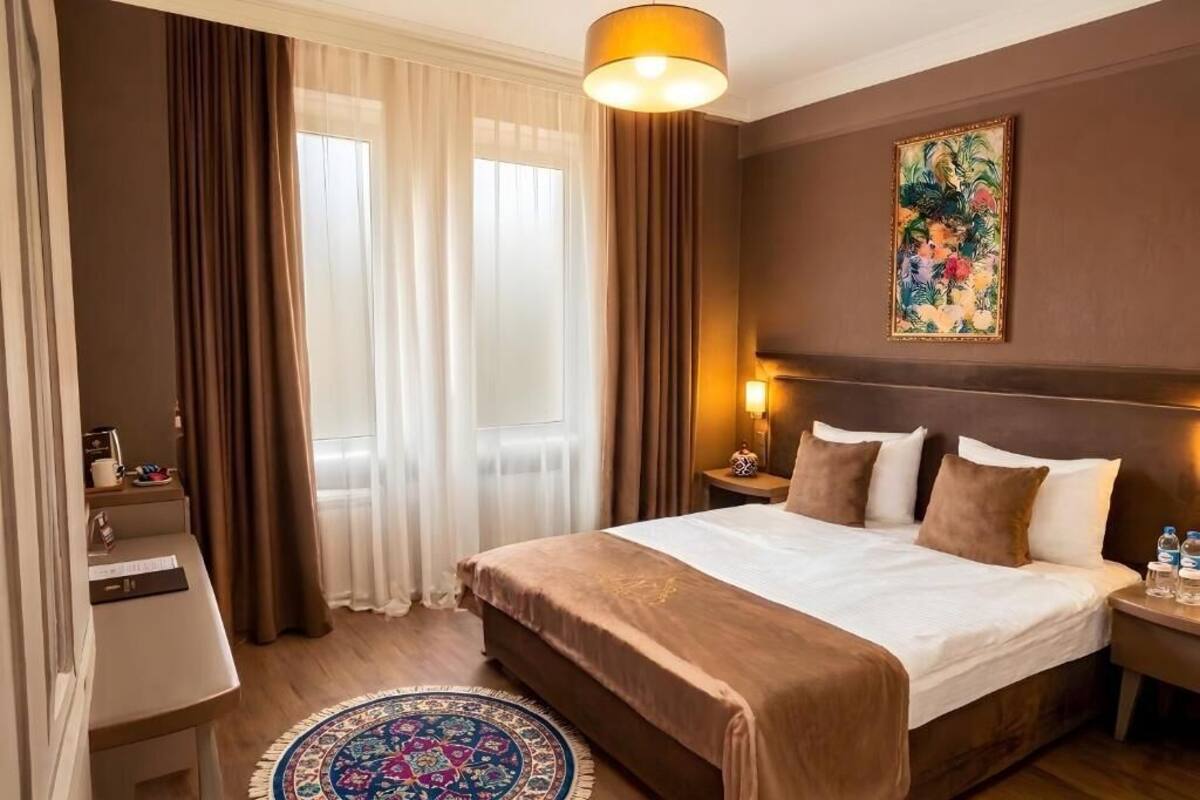 Deluxe Double Room | Premium bedding, in-room safe, desk, blackout drapes